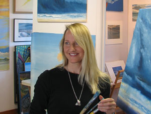 Zofia in studio with brushes 